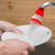 Small 360-degree shower head faucet, plastic design.
